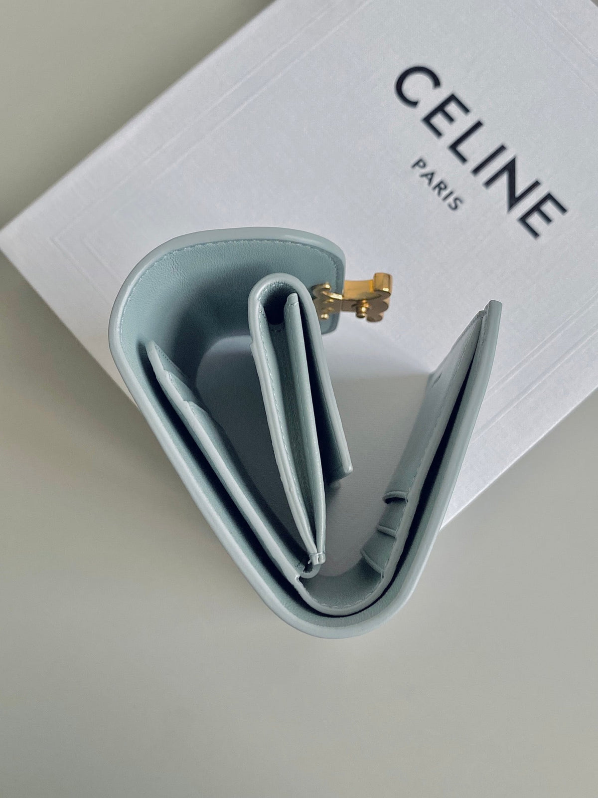CELINE TRIPHOME 10 TRIFOLD WALLET CALFSKIN BLUE PASTEL