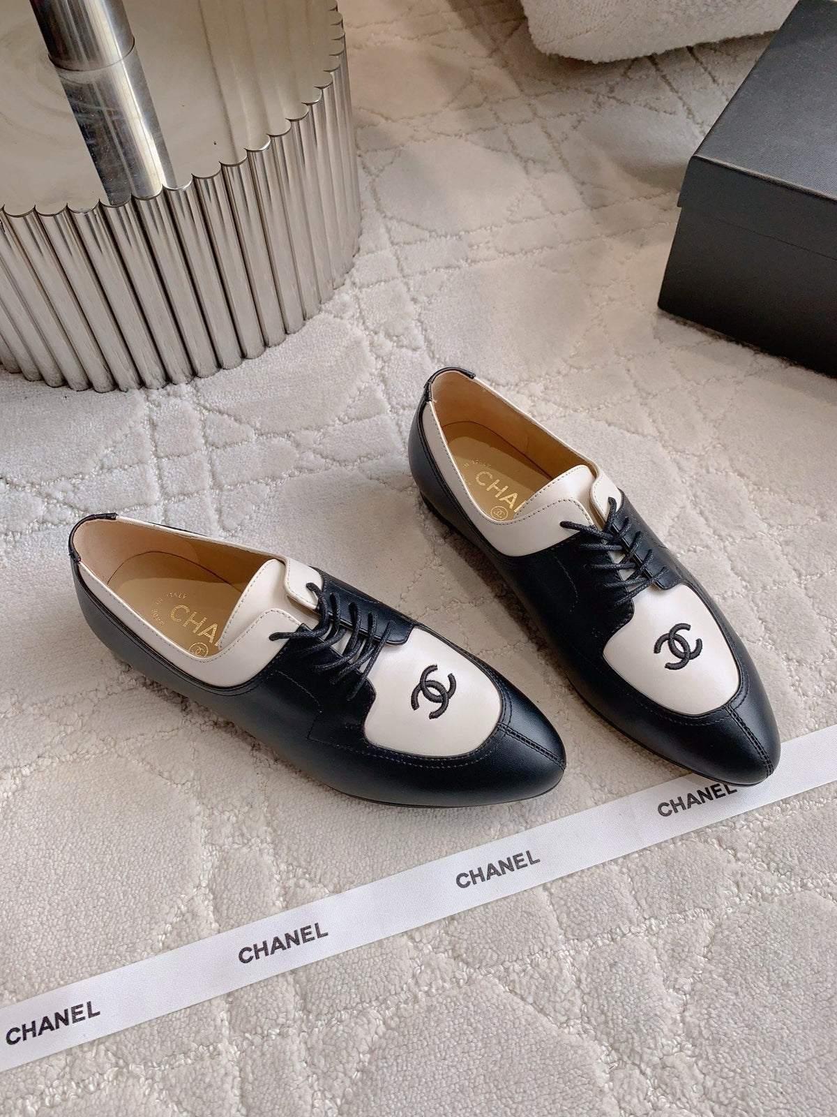 CHANEL 25S TWO TONE LACE UP IN BLACK AND WHITE CALFSKIN