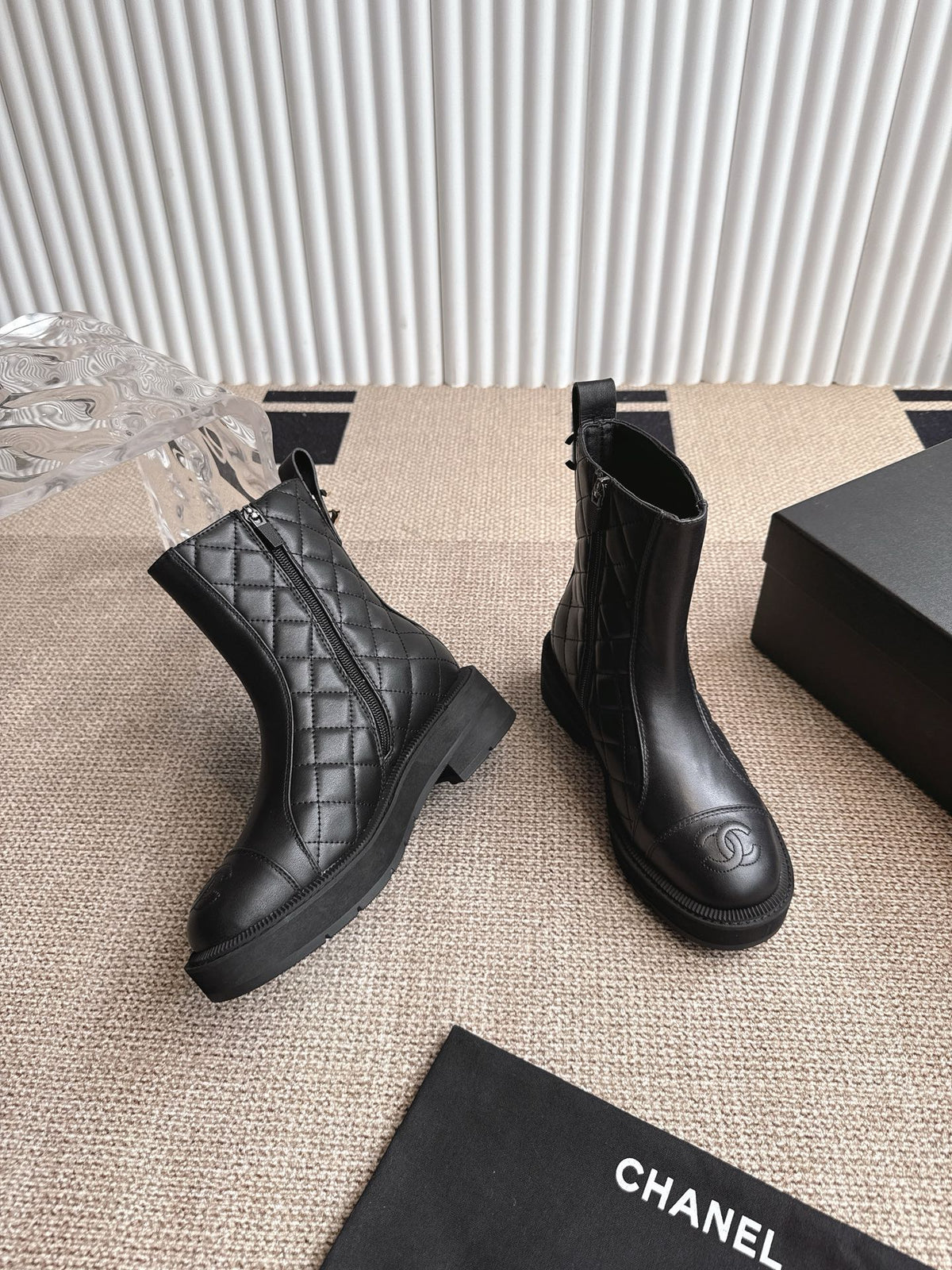 CHANEL ANKLE BOOTS IN BLACK QUILTED CALFSKIN