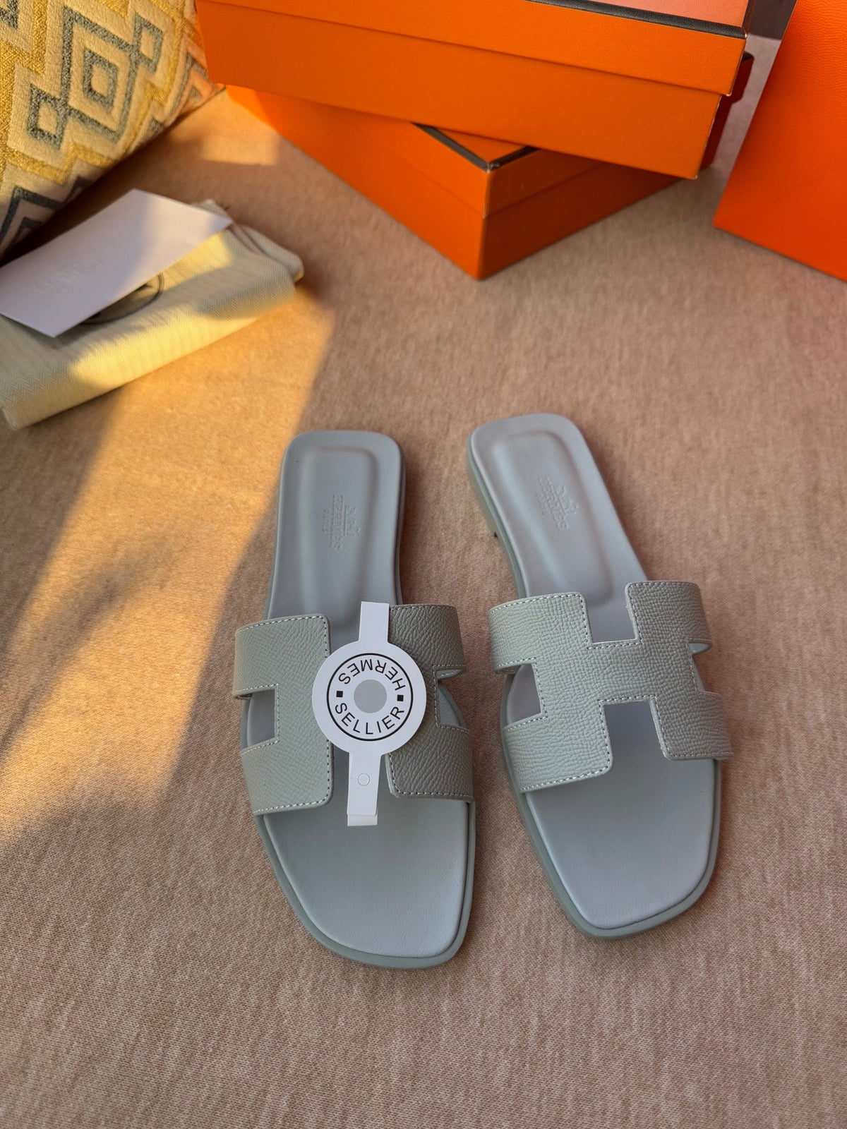 HERMES 0RAN SANDALS IN WARM GRAY CALFSKIN