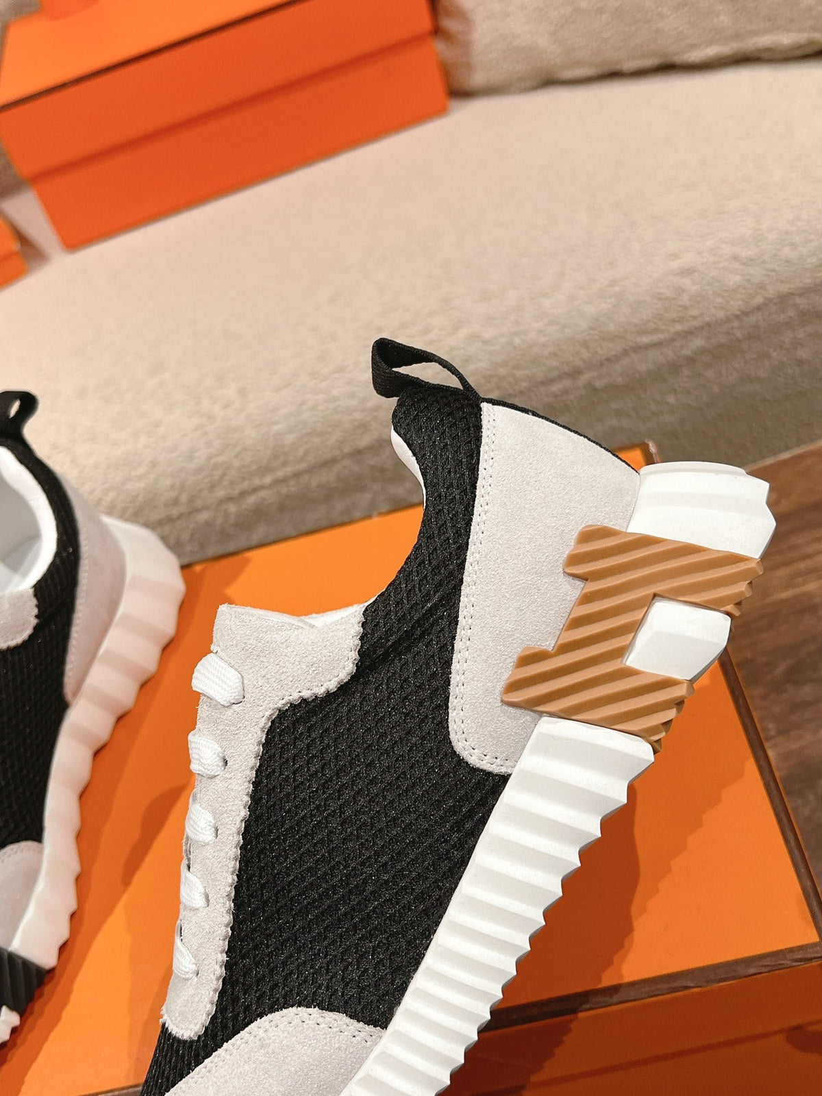 HERMES MAINLAND SNEAKER IN PALE GRAY SUEDE AND BLACK BREATHABLE MESH FABRIC